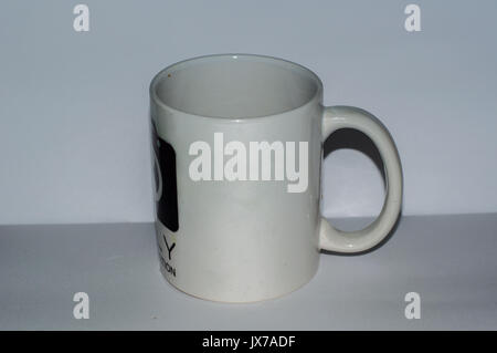 Surabaya,Indonesia -  12 august : this is a white mug that i used for drink, this mug little bit dirty cause i used it everyday Stock Photo