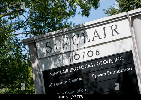 A logo sign outside of the headquarters of the Sinclair Broadcast Group in Cockeysville, Maryland, on August 13, 2017. Stock Photo