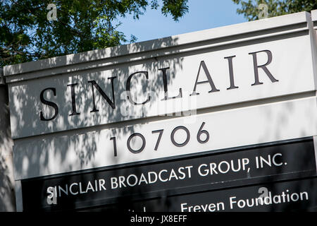 A logo sign outside of the headquarters of the Sinclair Broadcast Group in Cockeysville, Maryland, on August 13, 2017. Stock Photo