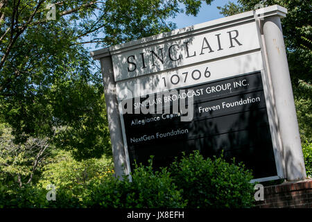 A logo sign outside of the headquarters of the Sinclair Broadcast Group in Cockeysville, Maryland, on August 13, 2017. Stock Photo