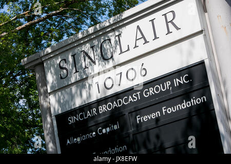 A logo sign outside of the headquarters of the Sinclair Broadcast Group in Cockeysville, Maryland, on August 13, 2017. Stock Photo