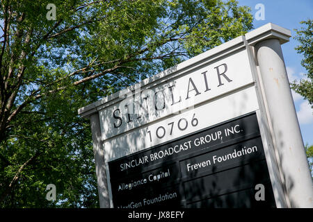 A logo sign outside of the headquarters of the Sinclair Broadcast Group in Cockeysville, Maryland, on August 13, 2017. Stock Photo