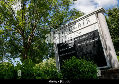 A logo sign outside of the headquarters of the Sinclair Broadcast Group in Cockeysville, Maryland, on August 13, 2017. Stock Photo