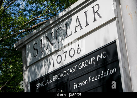 A logo sign outside of the headquarters of the Sinclair Broadcast Group in Cockeysville, Maryland, on August 13, 2017. Stock Photo