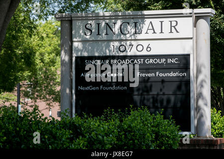 A logo sign outside of the headquarters of the Sinclair Broadcast Group in Cockeysville, Maryland, on August 13, 2017. Stock Photo