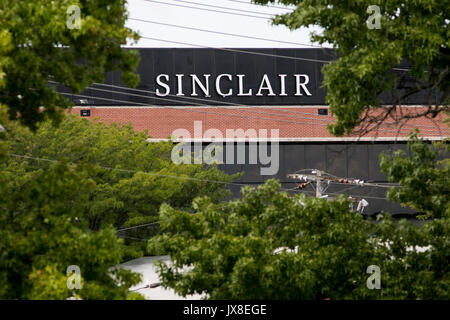 A logo sign outside of the headquarters of the Sinclair Broadcast Group in Cockeysville, Maryland, on August 13, 2017. Stock Photo