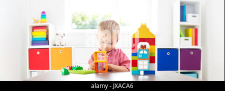 Little child playing with blocks Stock Photo