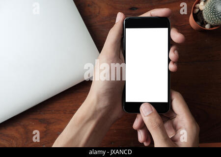 man using smart phone with blank mobile can be add your texts or others. Stock Photo