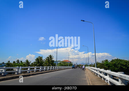 Traffic on the bridge in Phan Thiet, Vietnam. Phan Thiet is the capital of Binh Thuan Province and is surrounded by pristine beaches such as Mui Ne, K Stock Photo