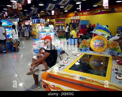 AGONO, RIZAL, PHILIPPINES - AUGUST 12, 2017: Different games and attractions inside an amusement arcade. Stock Photo