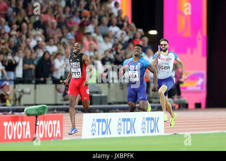 Lalonde GORDON (Trinidad and Tobago) Fred KERLEY (USA) & Martyn ROONEY (Great Britain) on the final leg of the Men's 4 x 400m Final at the 2017 IAAF World Championships, Queen Elizabeth Olympic Park, Stratford, London, UK. Stock Photo