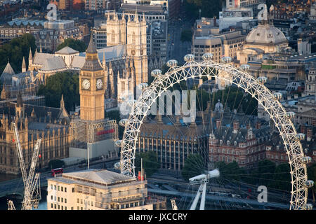 General aerial view of the London Eye, the Houses of Parliament, Portcullis House and Westminster Abbey in Westminster, London. Stock Photo