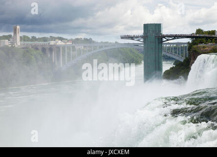 Rainbow Bridge and the Observation Platform seen across Niagara Falls, New York State, USA Stock Photo