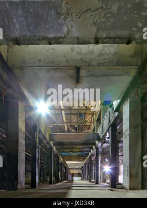 Looking up from basement into empty production halls of closed E B Eddy paper mill in Ottawa, Canada. Stock Photo