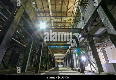 Looking up from basement into empty production halls of closed E B Eddy paper mill in Ottawa, Canada. Stock Photo