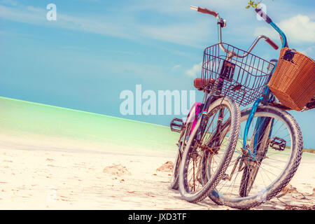 View on bikes on paradies beach of Holbox Island in Yuckatan - Mexico Stock Photo