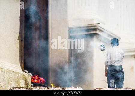 View on traditional indigenous maya ceremony in Chichicastenango - Guatemala Stock Photo