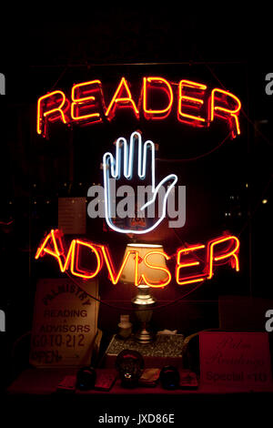 Palm Reader and Adviser Neon Sign in New York - USA Stock Photo
