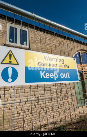 'Warning, construction site, keep out' sign in Langtoft, near Peterborough, Lincolnshire, England, UK.