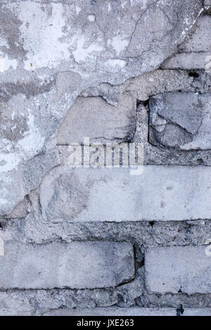 Partially ruined brick wall Stock Photo
