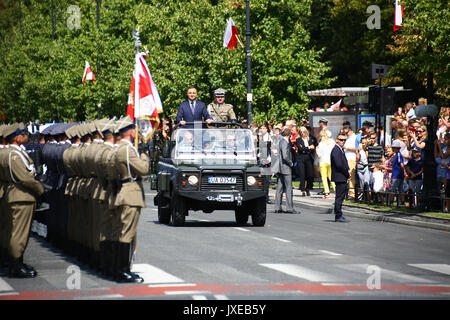 Warsaw, Poland, 15th August 2017: Polish Army holds celebration day with a military parade of armed and air forces on the 97th anniversary of the battle of Warsaw in 1920. Troops, vehicles tanks and aircrafts, as MiG-29s, Apache AH-64s, Black Hawks, M1 Abrams and special forces hits the city of Warsaw. Allied NATO soldiers, thousands of visitors, President Andrzej Duda, Prime Minister Beata Szydlo and the Minister of Defense Antoni Macierewicz join the official event. Polish Army celebrates the 97th anniversary of the battle of Warsaw in 1920. Credit: Jake Ratz/Alamy Live News Stock Photo
