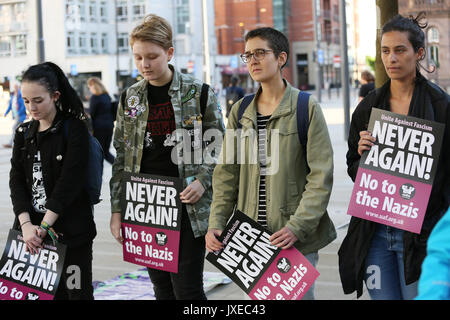 Manchester, UK. 15th Aug, 2017. 'Never Again no to the Nazis' placards held at vigil for Heather Heyer who was killed in Charlottesville after a car crashed into demonstrators protesting a white supremacy rally, St Peters Square, Manchester, 15th August, 2017 Credit: Barbara Cook/Alamy Live News Stock Photo