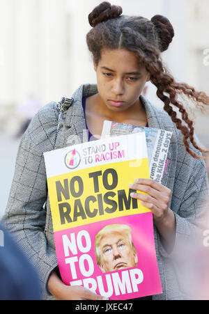Manchester, UK. 15th Aug, 2017. A women holds a placard which reads 'No To Racism No To Trump', St Peters Square, Manchester, 15th August, 2017 Credit: Barbara Cook/Alamy Live News Stock Photo