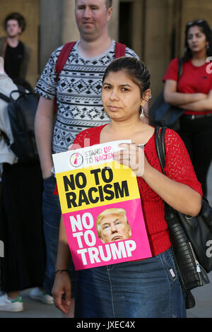 Manchester, UK. 15th Aug, 2017. A demonstrator with a 'No To racism No To Trump' placard, St Peters Square, Manchester, 15th August, 2017 Credit: Barbara Cook/Alamy Live News Stock Photo
