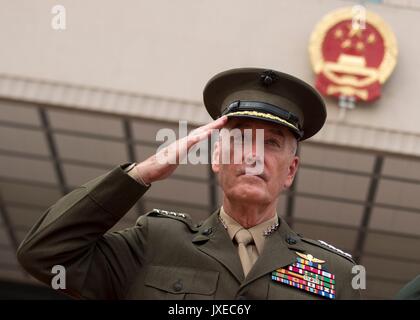 Beijing, China. 15th Aug, 2017. U.S. Chairman of the Joint Chiefs Gen. Joseph Dunford salutes during a red carpet arrival ceremony at the Bayi building August 15, 2017 in Beijing, China. Dunford and Fang signed an agreement to strengthen communication between the two militaries amid tensions concerning North Korea. Credit: Planetpix/Alamy Live News Stock Photo