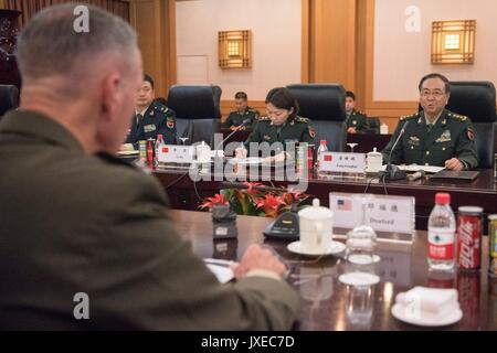 Beijing, China. 15th Aug, 2017. Chinese People's Liberation Army Gen. Fang Fenghui, right, during roundtable discussions with U.S. Chairman of the Joint Chiefs Gen. Joseph Dunford at the Bayi building August 15, 2017 in Beijing, China. Dunford and Fang signed an agreement to strengthen communication between the two militaries amid tensions concerning North Korea. Credit: Planetpix/Alamy Live News Stock Photo