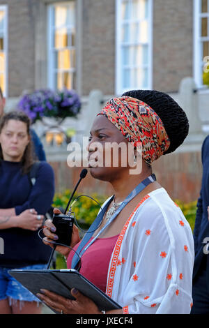 Bristol, UK. 15th August, 2017. The Deputy Mayor of Bristol, Asher Craig, speaks at a vigil to mark the death of Heather Heyer, who was killed while attending an anti-fascist demonstration in Charlottesville, Virginia, USA. Keith Ramsey/Alamy Live News Stock Photo