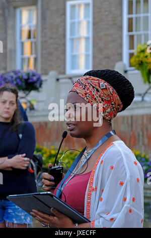 Bristol, UK. 15th August, 2017. The Deputy Mayor of Bristol, Asher Craig, speaks at a vigil to mark the death of Heather Heyer, who was killed while attending an anti-fascist demonstration in Charlottesville, Virginia, USA. Keith Ramsey/Alamy Live News Stock Photo