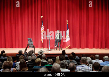 Washington, Iowa, USA. 15th August, 2017. US Senator Joni Ernst (Republican) held a town hall meeting at a high school in Washington, Iowa during the senate recess. Constituents questioned the senator about many issues including healthcare, defunding Planned Parenthood, immigration, and the violence in Charlottesville, Virginia. Credit: Keith Turrill/Alamy Live News Stock Photo