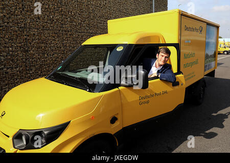 Cologne, Germany. 16th Aug, 2017. Co-founder of StreetScooter GmbH, Achim Kampker, sitting in a StreetScooter in Cologne, Germany, 16 August 2017. Deutsche Post DHL Group and Ford presented the StreetScooter WORK XL electric van. Photo: Oliver Berg/dpa/Alamy Live News Stock Photo