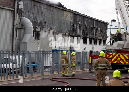Southend on sea, Essex, UK. 16th August 2017. Airport Fire. A large fire has broken out at the Air Livery hangar based at London Southend Airport at around 11:00 AM Fire crews were quick to respond to the incident. Credit: Darren Attersley/Alamy Live News Stock Photo