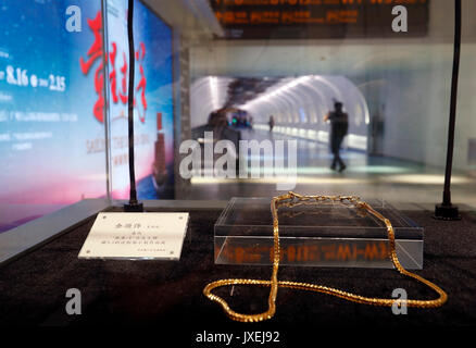 (170816) -- GUANGZHOU, Aug. 16, 2017 (Xinhua) -- Photo taken on Aug. 16, 2017 shows an item displayed at an exhibition in the cultural corridor in the Baiyun International Airport of Guangzhou, capital of south China's Guangdong Province. Guangzhou Baiyun International Airport, together with the provincial museum, held a public exhibition themed on the Maritime Silk Road, the first one at the historical cultural corridor which officially opened here Wednesday. (Xinhua/Liang Xu)(wjq) Stock Photo