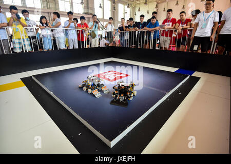 Rizhao, China's Shandong Province. 16th Aug, 2017. A fight between robots is held at China robot competition in Rizhao City, east China's Shandong Province, Aug. 16, 2017. A total of 3,450 contestants from 210 universities participated in the contest. Credit: Lu Jie/Xinhua/Alamy Live News Stock Photo