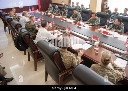 Shenyang, China. 16th Aug, 2017. U.S. Chairman of the Joint Chiefs Gen. Joseph Dunford, left, joins People's Liberation Army Gen. Song Puxuan, right, during roundtable discussions at Infantry Brigade Headquarters for the Chinese Northern Theater Command August 16, 2017 in Haichung, China. Dunford told Chinese leaders that the U.S. hoped diplomatic and economic pressure would convince North Korea to end its nuclear program, but that it was also preparing military options. Credit: Planetpix/Alamy Live News Stock Photo
