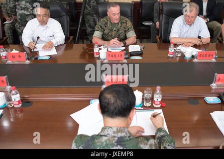 Shenyang, China. 16th Aug, 2017. U.S. Chairman of the Joint Chiefs Gen. Joseph Dunford, center, joins People's Liberation Army Gen. Song Puxuan, during roundtable discussions at Infantry Brigade Headquarters for the Chinese Northern Theater Command August 16, 2017 in Haichung, China. Dunford told Chinese leaders that the U.S. hoped diplomatic and economic pressure would convince North Korea to end its nuclear program, but that it was also preparing military options. Credit: Planetpix/Alamy Live News Stock Photo
