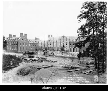 Alumni Memorial Residences Exterior of AMR looking East, Workers are completing the main entrance, Canopy above entrance has been placed, 1923. Stock Photo