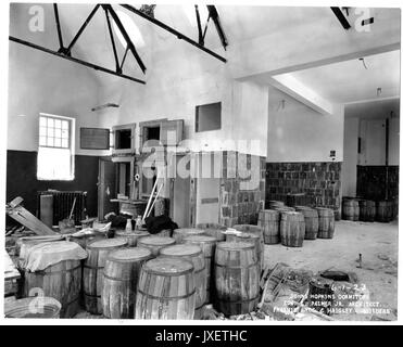 Alumni Memorial Residences Interior of AMR, most likely of kitchen, Kegs and construction material are on the floor, 1923. Stock Photo