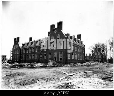 Alumni Memorial Residences AMR looking southeast, Exterior close to completion, Piles of dirt, rubble surround the building, 1923. Stock Photo