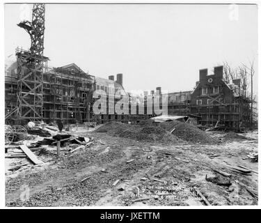 Alumni Memorial Residences AMR looking SE, Main section with pediment and a wing are visible underneath the scaffolding, 1923. Stock Photo