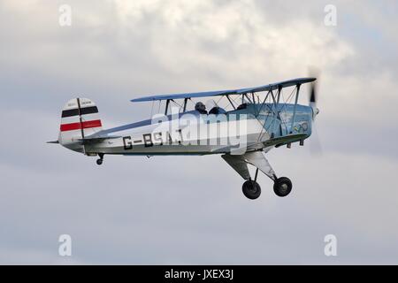 Bücher Jungmann G-BSAJ with the 1936 Berlin Olympics colour scheme Stock Photo