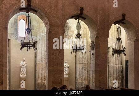 Interior of Syracuse Duomo showing doric columns from the original ancient Greek temple, Sicily, Italy. Stock Photo