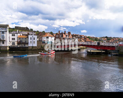 Fishing boat returning to Whitby Harbour Stock Photo - Alamy