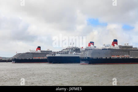 The Three Queens, Elizabeth, Victoria and Mary pictured on the River Mersey in celebration of Cunard's 175th anniversary. Stock Photo