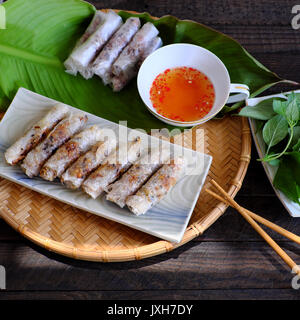 Vietnamese spring roll pastry or cha gio is popular food at Vietnam cuisine, stuffing from meat and wrapper by rice paper, then deep fried, eat Stock Photo