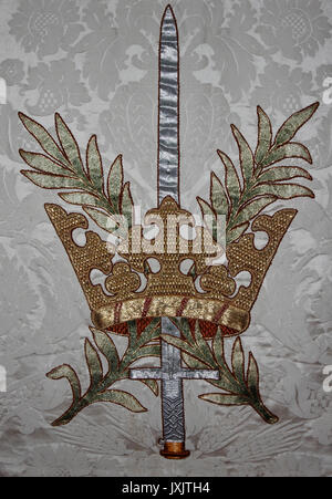 Sword and Crown Embrioidery on Altar Cloth, Medieval Church of St Mary's, Caerhun, Wales Stock Photo