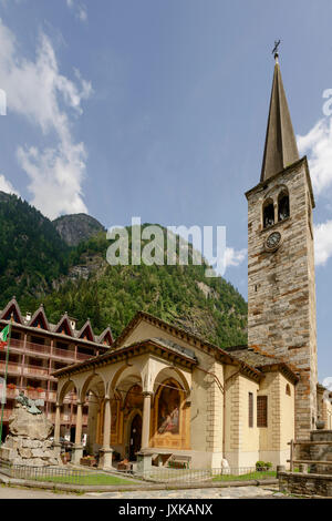 view of san Giovanni Battista church and Bell tower, shot on bright summer day at Alagna, Valsesia, Vercelli, Italy Stock Photo